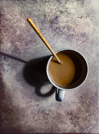 Coffee and chopstick in a mugの写真素材