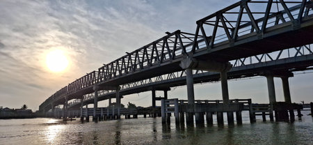 Kapuas 2 Bridge as the sun rises from the eastern horizonの写真素材