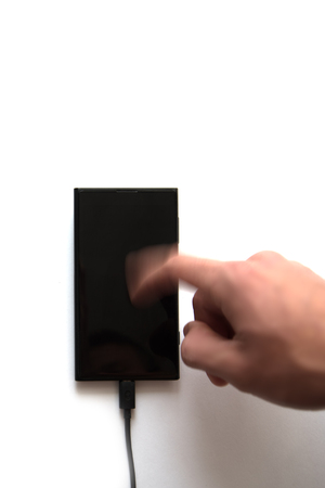 smartphone and hand on white background