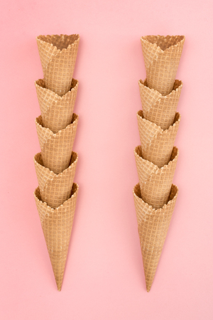 Ice cream cones on pink backgroundの写真素材