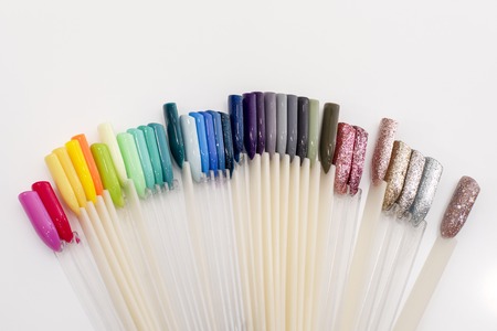 Set of different colored nail patterns on white backgroundの写真素材