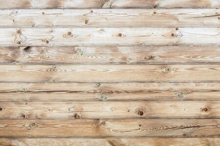 Wooden natural light background of smooth boards
