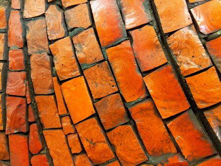 Terracotta brick wall pattern detail abstract backgroundの写真素材