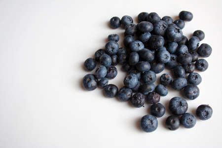 Heap of ripe blueberries isolated on white background