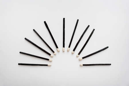 Black wooden safety matches sunset silhouette isolated on white background