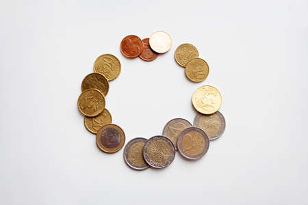 Euro coins of different value in circle isolated on white backgroundの写真素材