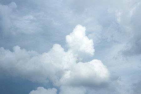 Sky with clouds,The sky was bright and surrounded by clouds.