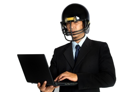 Business man  american football helmet hold notebook in isolatedの写真素材