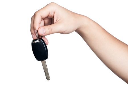 hand sign posture hold car key in isolatedの写真素材