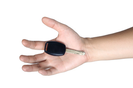hand sign posture hold car key in isolatedの写真素材