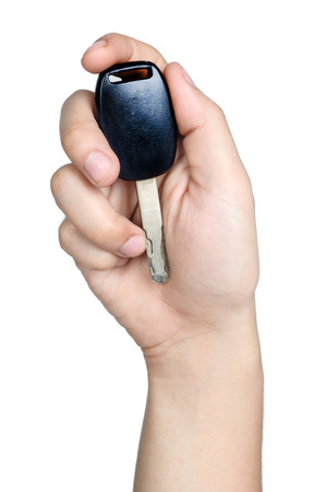 hand sign posture hold car key in isolatedの写真素材