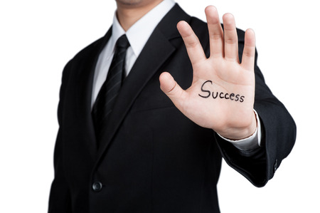 business man hand success in isolatedの写真素材