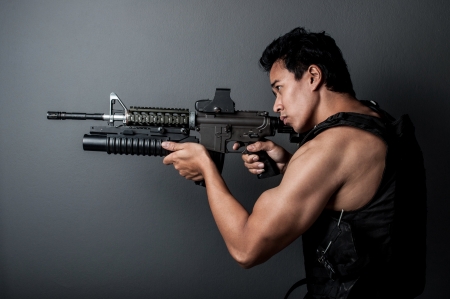 soldier hold Machine gun shoot