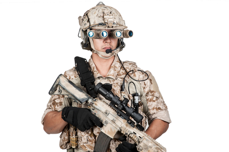soldier man full armor hold machine gun isolatedの写真素材