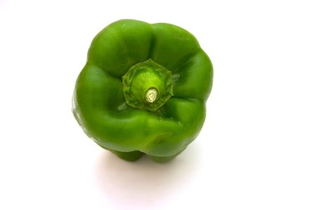 Single green pepper isolated over white.の写真素材