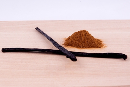 raw cinamon and vanilla on wooden tableの写真素材