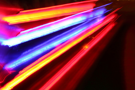 Traffic lights in motion blur. City never sleeps.
