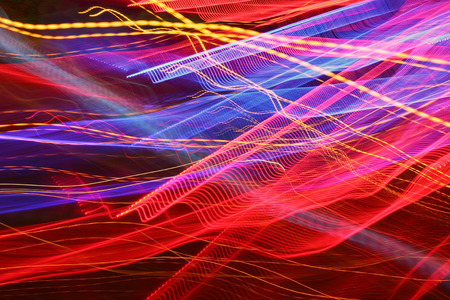 Traffic lights in motion blur. City never sleeps.