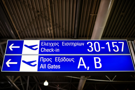 Gate A, B. Sign in greek airport. Interior of the airport.の写真素材