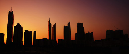 awesome sunset over modern cityの写真素材