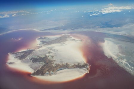 Flying over Syria. Ten kilometers  high over clouds.  Looking through window aircraft.の写真素材