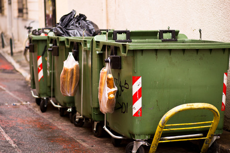 Plastic garbage cans in the street of Athens.