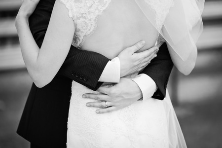 hold me, trust me, marry me today, newly wed couple in black and whiteの写真素材
