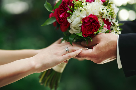 marry me today and everyday, hands of a wedding caucasian coupleの写真素材