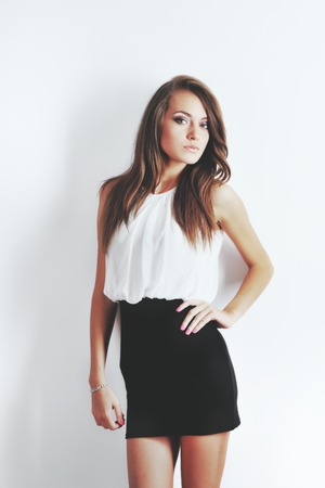 Portrait of young pretty  woman in studio.の写真素材