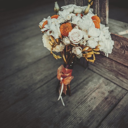Stylish wedding bouquet on wooden background.の写真素材