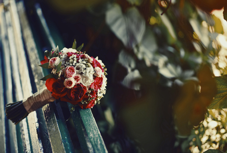 wedding bouquet with peonies on a bench, summertime pictureの写真素材
