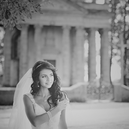 Wedding picture of happy brunette bride outside.の写真素材