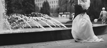 Black and white picture of happy wedding couple outside.の写真素材