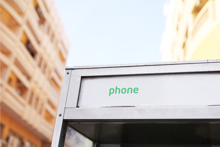 Aluminium public pay telephone at street of Dubai.