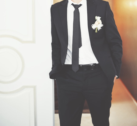 Caucasian young stlylish groom on wedding day.の写真素材