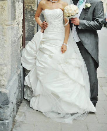 Newlywed couple on the street. Happy togetherの写真素材