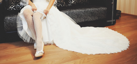 Young bride outside on wedding dayの写真素材