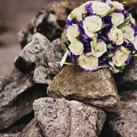 wedding bouquet on stoneの写真素材