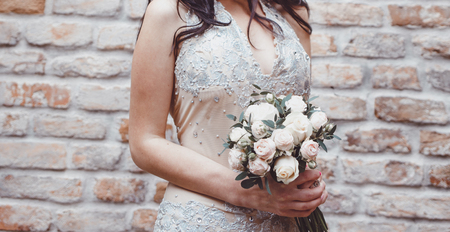 Bride with Her Bouquet made of rosesの写真素材