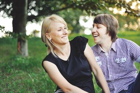 Couple in love spending time together, summertime sunsetの写真素材