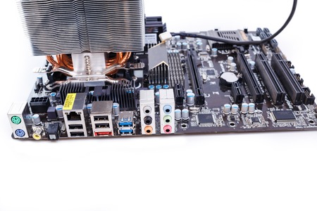 motherboard with CPU and cooler on white background
