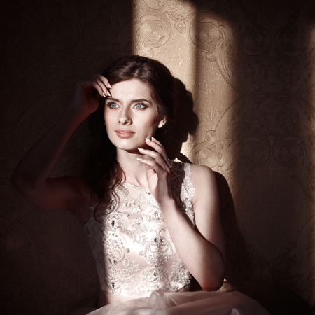 happy girl in long prom dressの写真素材