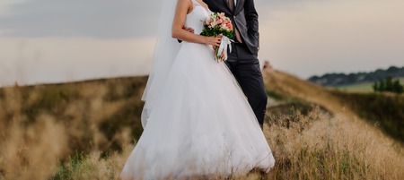 bridal couple posing, happy wedding, bride and groom togetherの写真素材