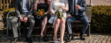 Friends celebrating a wedding togetherの写真素材