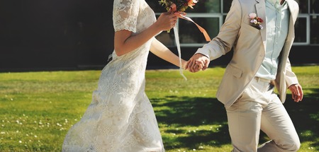 asian bridal running around, happy wedding, bride and groom togetherの写真素材