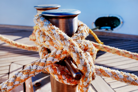 Rope tied up for safety on a boatの写真素材