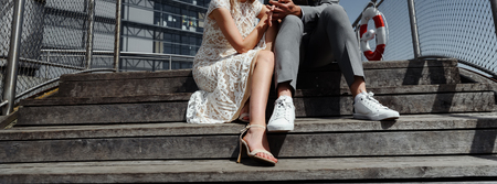 Young married couple together walking around the cityの写真素材