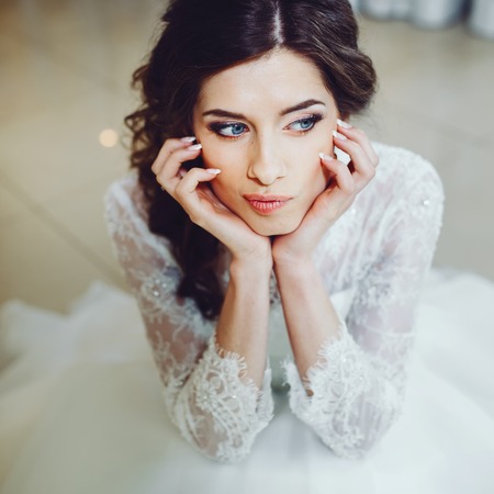 A fashion model posing wearing wedding dress.の写真素材