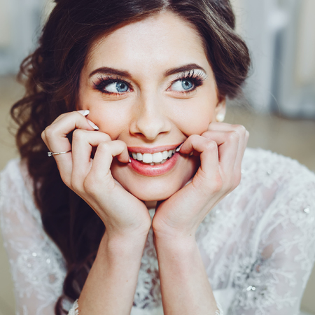 A fashion model posing wearing wedding dress.の写真素材