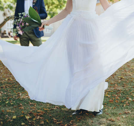 Bridal couple posing together, happy bride and groom.の写真素材